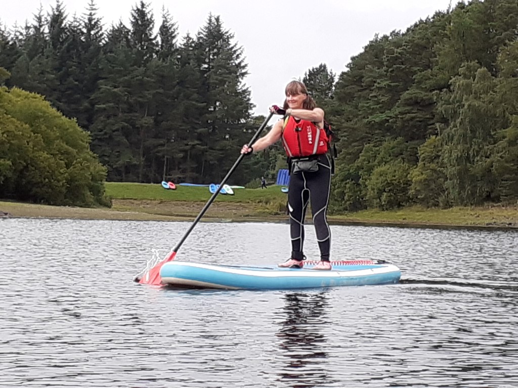 paddleboarding on Gladhouse reservoir Scotland