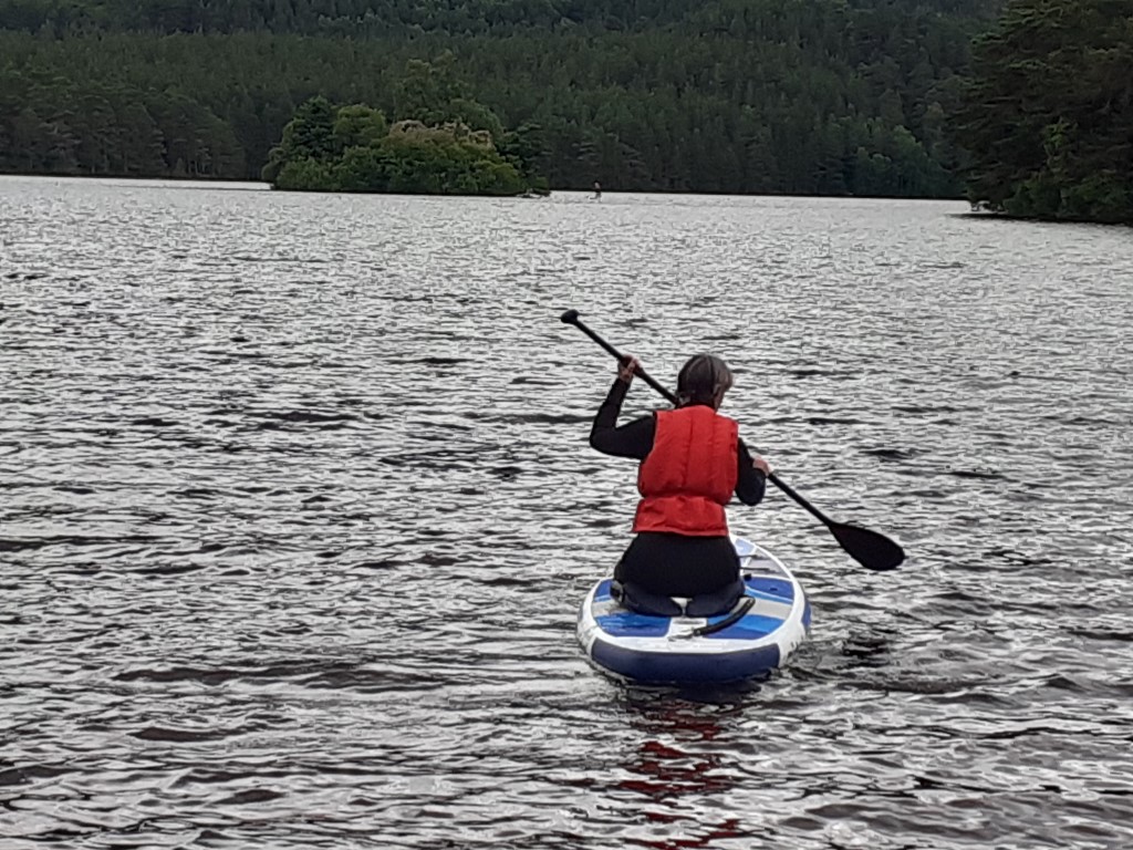 SUP on loch an eilein on choppy waters