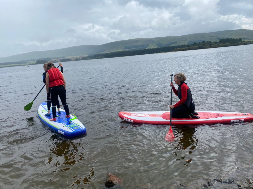 learning to paddleboard